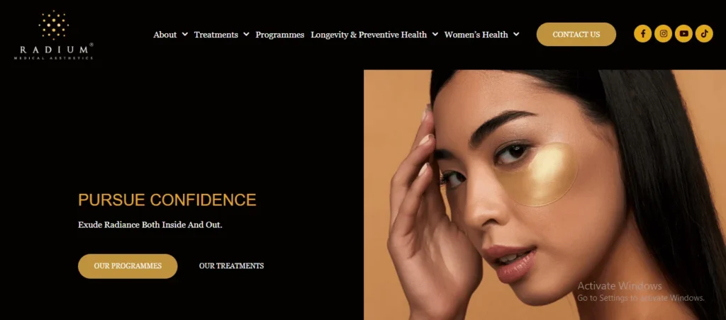 Homepage banner for Radium Medical Aesthetics featuring a dark background with the text "PURSUE CONFIDENCE" alongside a close-up image of a woman wearing a gold under-eye patch.