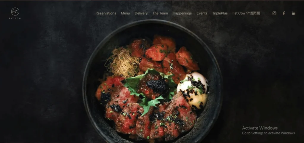 Fat Cow restaurant website homepage featuring a luxury Japanese wagyu beef donburi bowl with truffle and soft-boiled egg.