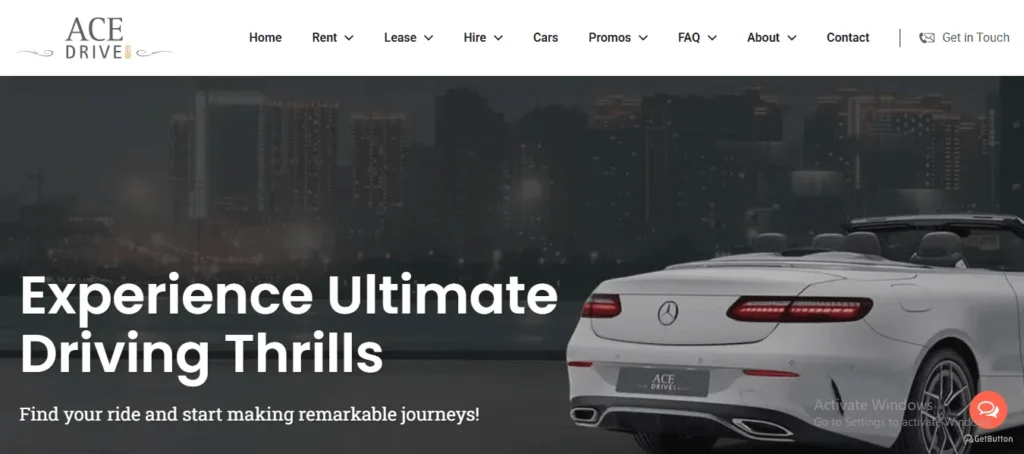 Website homepage for Ace Drive featuring the headline "Experience Ultimate Driving Thrills" and subheadline "Find your ride and start making remarkable journeys!" against a dark, night skyline background with a rear view of a white Mercedes-Benz convertible. The top navigation bar shows the Ace Drive logo alongside menu items for Home, Rent, Lease, Hire, Cars, Promos, FAQ, About, Contact, and a "Get in Touch" link. A round orange chat widget button is positioned at the bottom right corner.