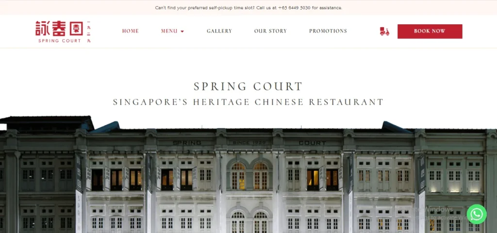 Website homepage of Spring Court, Singapore’s Heritage Chinese Restaurant, showing a classic shophouse storefront building under the website navigation menu.