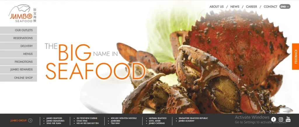 A screenshot of the Jumbo Seafood website homepage featuring a large close-up of a cooked crab dish in a rich sauce and the text "THE BIG NAME IN SEAFOOD."
