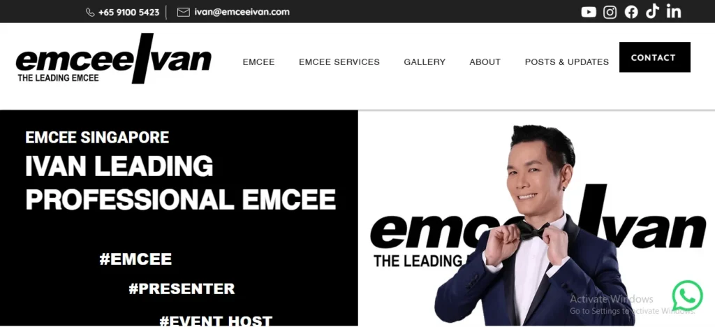 Website hero section for Emcee Ivan, a professional emcee in Singapore, featuring his logo, contact information, social media links, and a photo of him in a tuxedo adjusting his bow tie next to the text "Ivan Leading Professional Emcee."