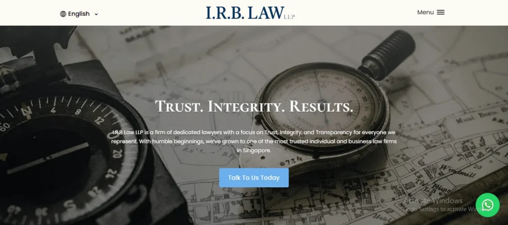 Screenshot of the homepage for law firm "I.R.B. LAW LLP". The header includes a language dropdown menu on the left, the firm's logo in the center, and a hamburger menu icon on the right. The background features a vintage map overlay with a brass compass and a pocket watch. Prominent white text reads "TRUST. INTEGRITY. RESULTS." above a brief intro paragraph describing I.R.B Law LLP as a trusted law firm in Singapore. A light blue call-to-action button reads "Talk To Us Today", and a green WhatsApp icon rests in the bottom right corner.