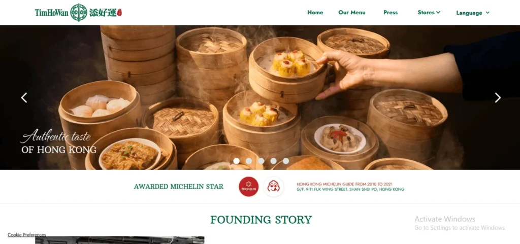 Website homepage banner for Tim Ho Wan restaurant, featuring stacks of steaming bamboo dim sum baskets and the text "Authentic taste of Hong Kong" alongside a Michelin Star award notice.