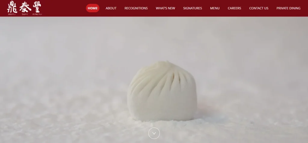 Din Tai Fung restaurant website homepage featuring their signature pleated xiao long bao dumpling.